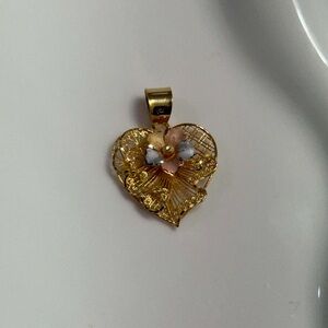 Elegant Gold Heart Pendant with Floral Accents